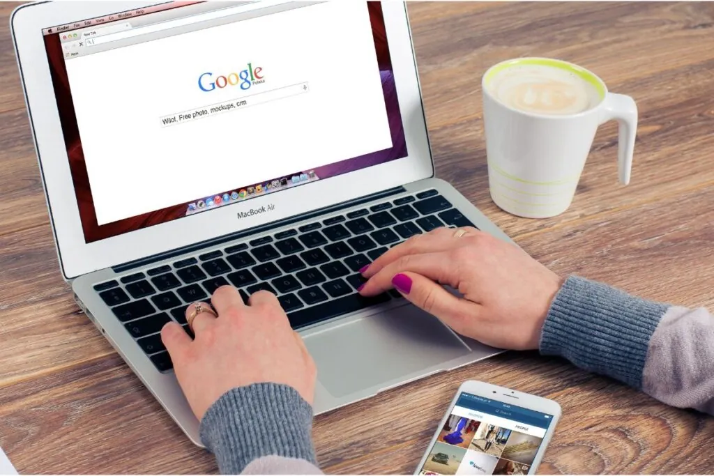 a woman using laptop for google business