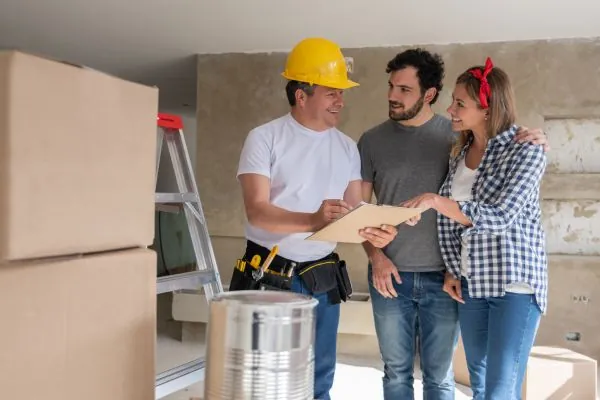 contractor talking to a couple